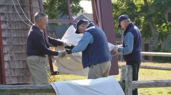 Raising sheets at the Old Mill.