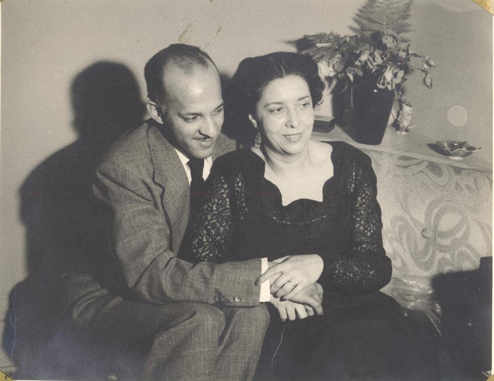 Man and woman sitting.